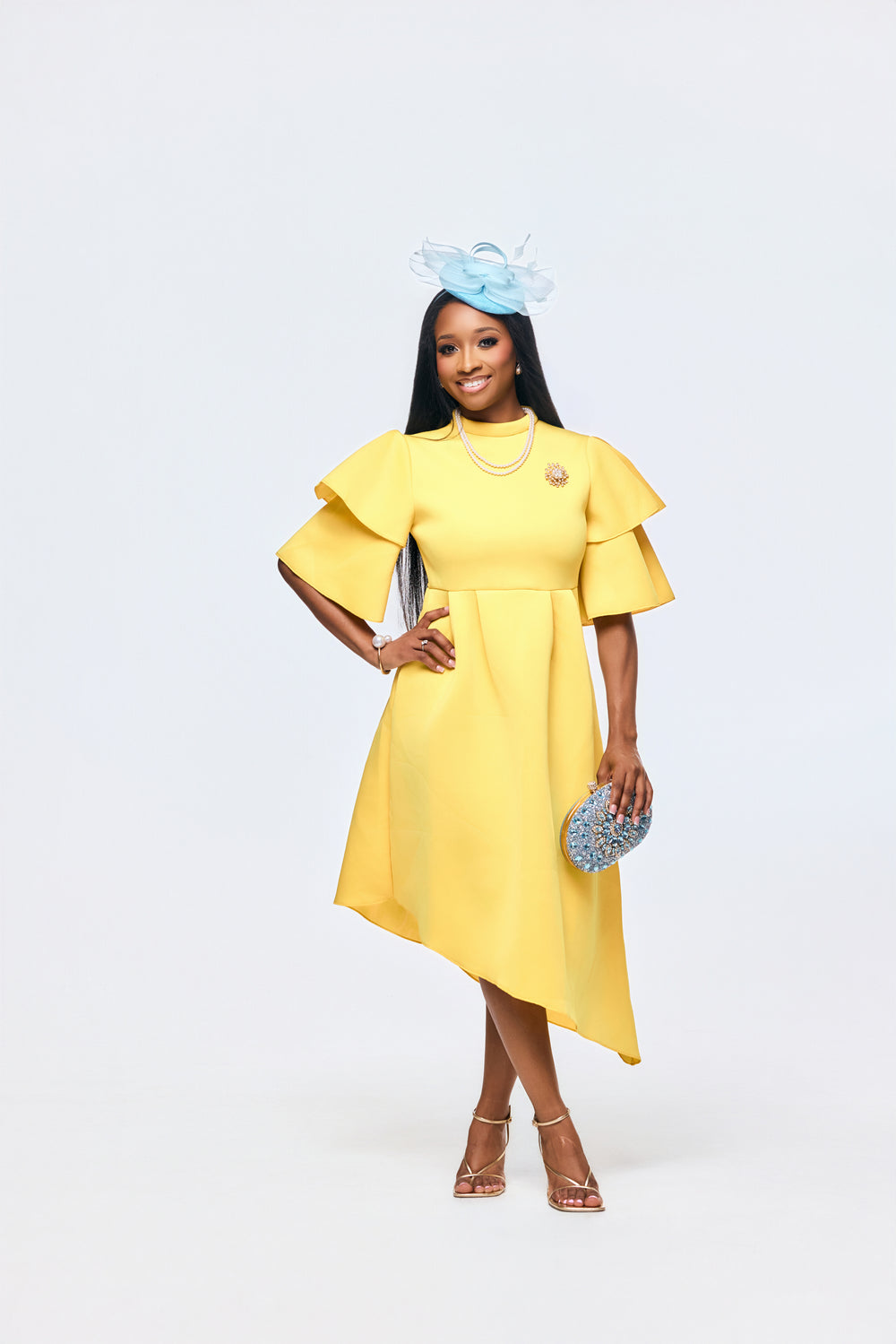 Feminine yellow Sunday dress with a high waist and A-line silhouette